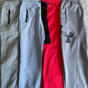 Boys Size 7 pants, 2 lightweight joggers and 2 pair track pants.